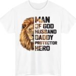 Man of God Husband Daddy Protector Hero T-Shirt | Christian Lion Graphic Tee | Faith-Based Father's Day Gift | Men’s Religious Shirt